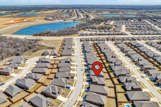 aerial view with a residential view and a water view