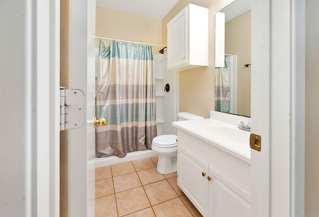 full bath featuring toilet, a shower with curtain, tile patterned flooring, and vanity