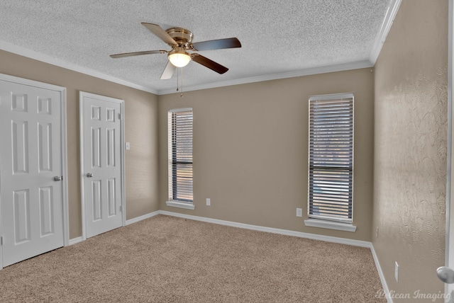 6090 Dorchester Cir, Keithville, LA 71047 - unfurnished bedroom featuring carpet floors, a textured ceiling, ceiling fan, and crown molding