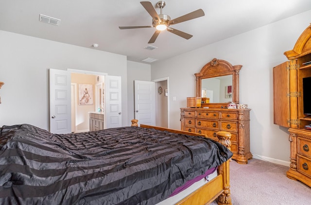 bedroom with light colored carpet, visible vents, ceiling fan, and baseboards