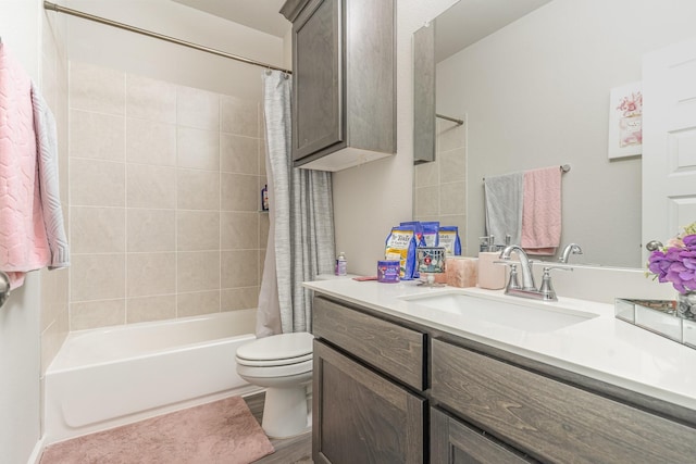 bathroom with vanity, toilet, and shower / bathtub combination with curtain