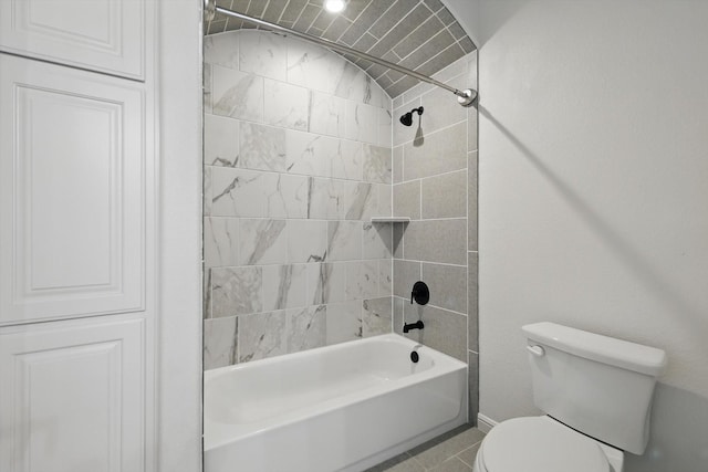 bathroom with toilet and bathing tub / shower combination