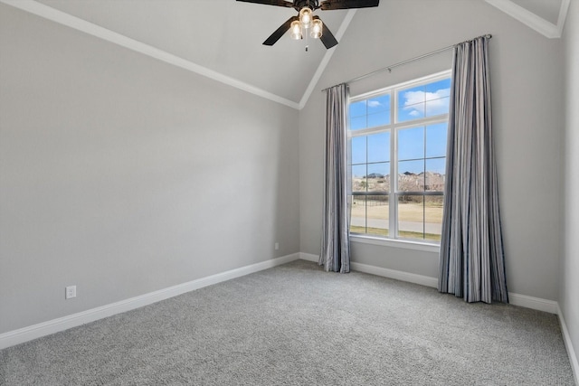 carpeted spare room with high vaulted ceiling, ornamental molding, a ceiling fan, and baseboards