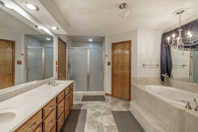 full bath with a textured ceiling, a sink, a bath, double vanity, and a stall shower