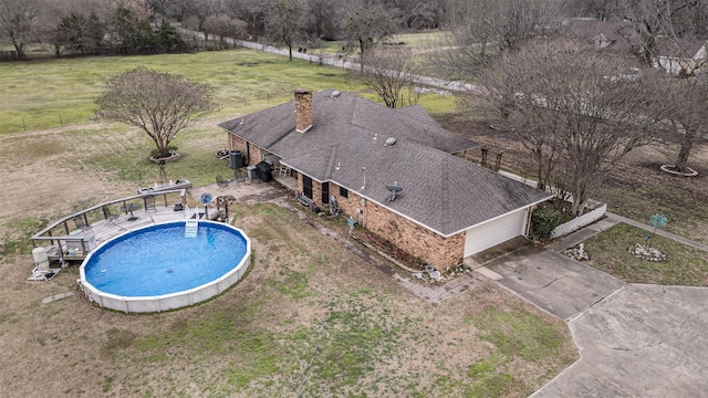 pool featuring a lawn