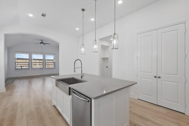 kitchen with white cabinetry, a sink, visible vents, dishwasher, and ceiling fan