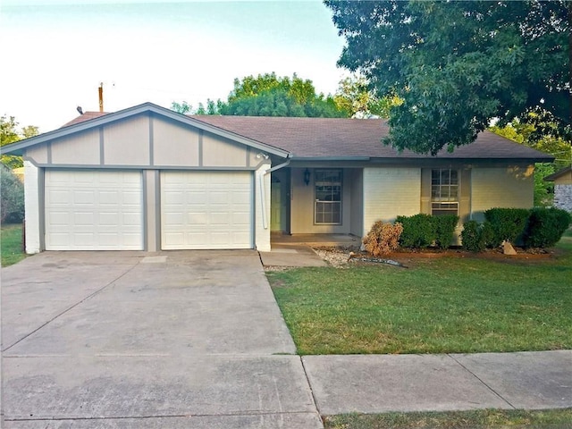 single story home featuring a garage, brick siding, concrete driveway, and a front yard