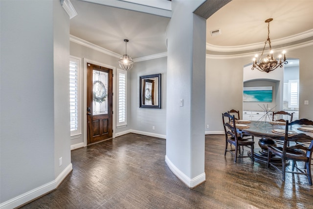 entryway with visible vents, dark wood-style flooring, and crown molding