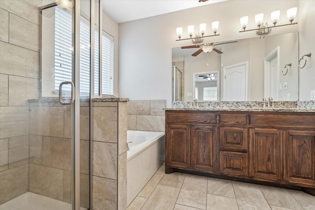 full bath with a garden tub, a sink, a ceiling fan, and a shower stall