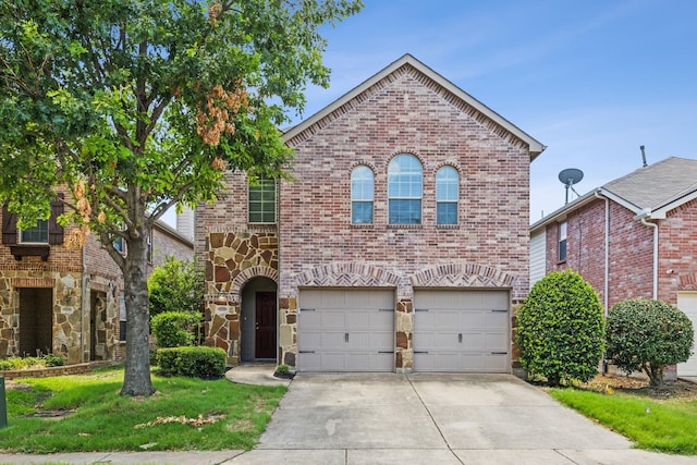 view of front of home featuring an attached garage, brick siding, driveway, stone siding, and a front lawn