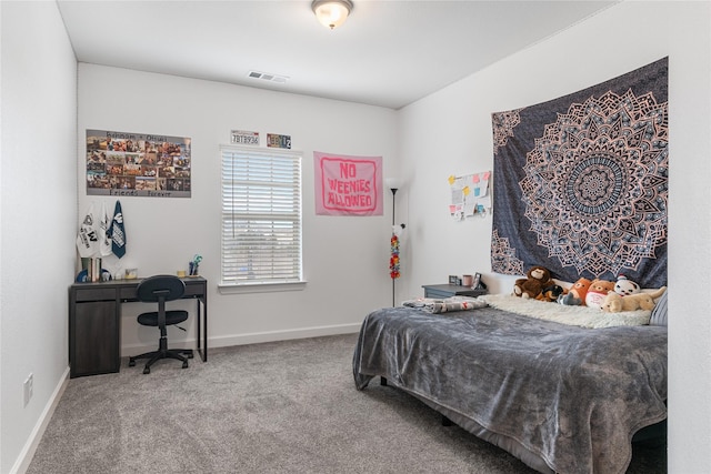 bedroom featuring carpet flooring, visible vents, and baseboards