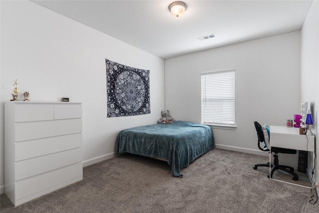 bedroom featuring carpet, visible vents, and baseboards