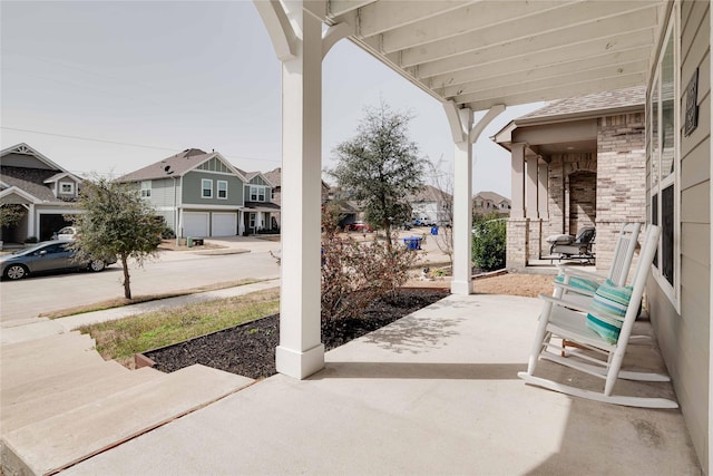 view of patio with a residential view