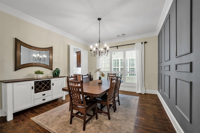 2204 Emerson Ln, Carrollton, TX 75010 - dining space with a chandelier, ornamental molding, dark wood-style flooring, and baseboards