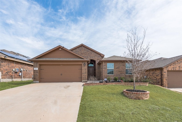 ranch-style home with driveway, an attached garage, a front lawn, and brick siding