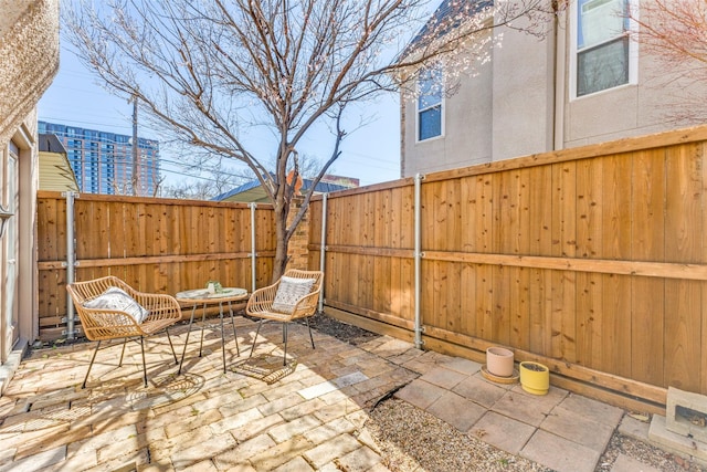 view of patio / terrace with fence