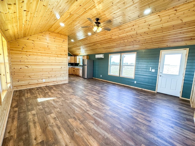 unfurnished living room with a wall unit AC, dark wood-style floors, lofted ceiling, ceiling fan, and wood ceiling