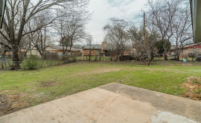 view of yard with a fenced backyard and a patio