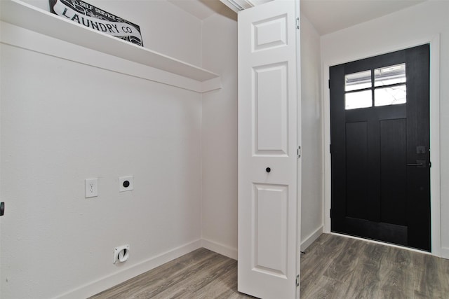 entrance foyer with wood finished floors and baseboards