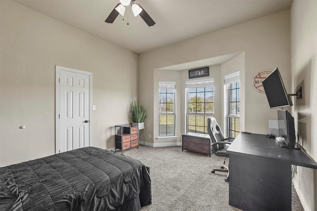 bedroom with carpet floors, ceiling fan, and baseboards