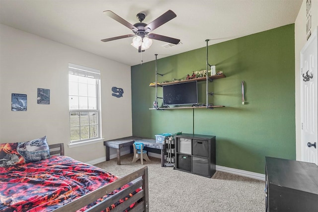 bedroom with baseboards, visible vents, ceiling fan, and carpet flooring