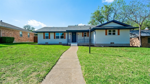 ranch-style house with crawl space, a front lawn, and brick siding