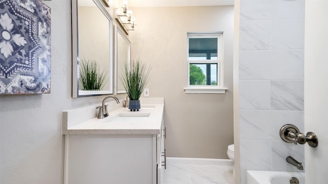 full bathroom with shower / bath combination, baseboards, toilet, marble finish floor, and vanity