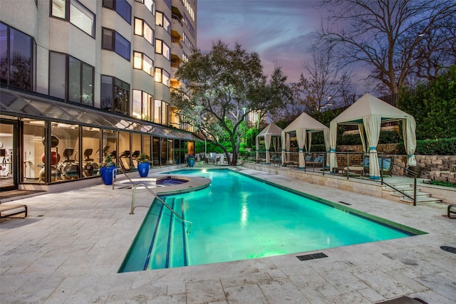 pool with a patio area