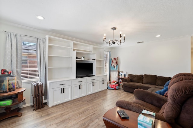 living room featuring light wood finished floors, recessed lighting, visible vents, and a notable chandelier