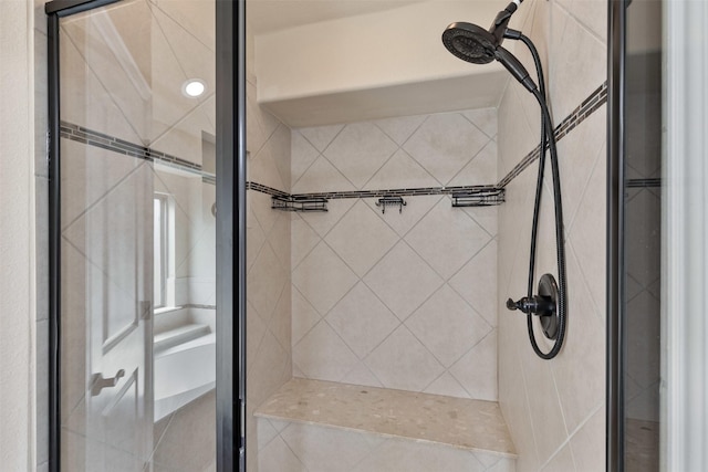 full bathroom featuring a shower stall