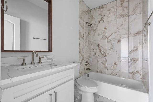 bathroom with toilet, marble finish floor, vanity, and bathing tub / shower combination