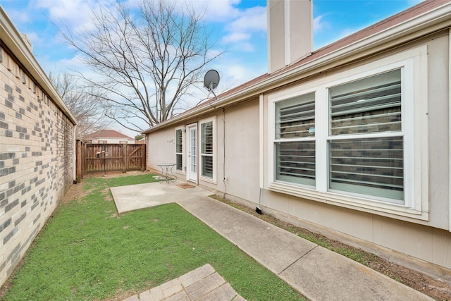 view of yard with a patio area and fence