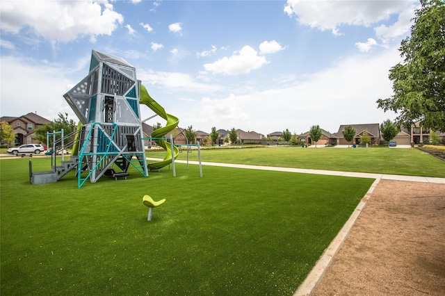 community play area with a lawn