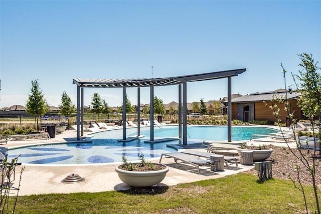 community pool featuring a patio area