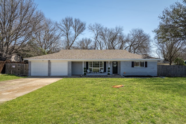 single story home with a garage, brick siding, fence, driveway, and a front lawn