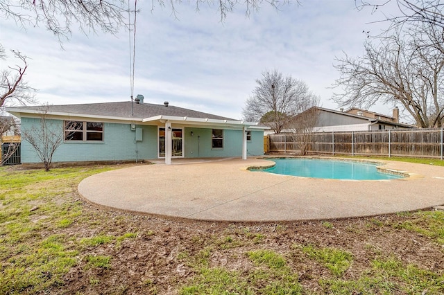 view of swimming pool featuring a patio area, a fenced backyard, and a fenced in pool