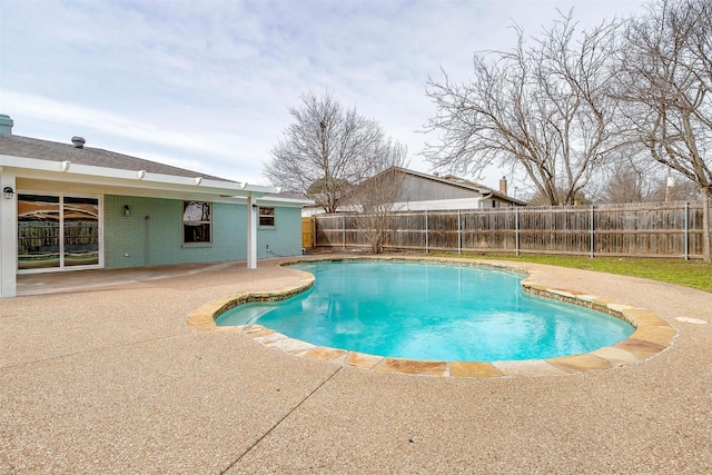 view of swimming pool with a fenced in pool, a patio area, and a fenced backyard