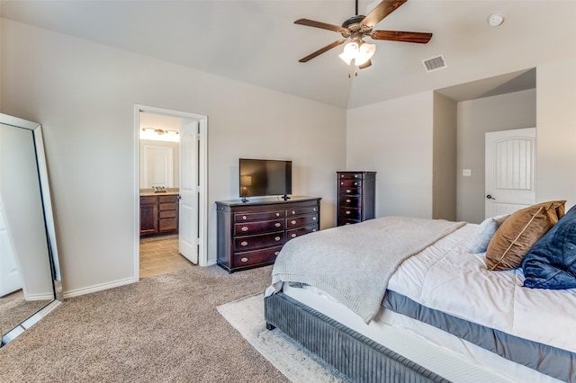 bedroom featuring a ceiling fan, baseboards, visible vents, lofted ceiling, and light carpet