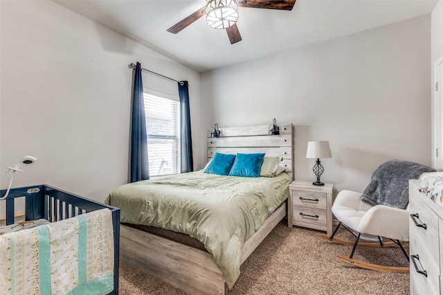 carpeted bedroom featuring a ceiling fan