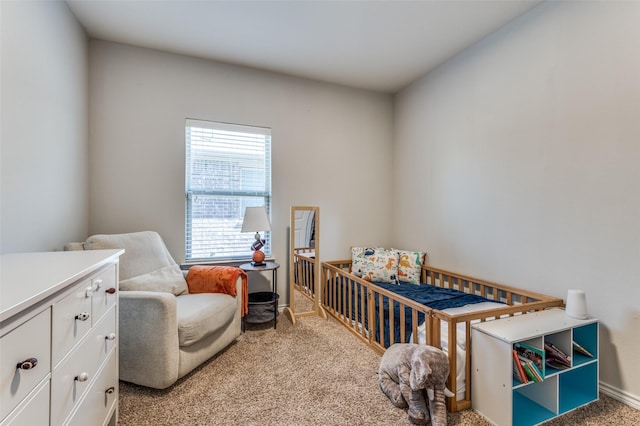 bedroom featuring light carpet