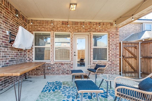 view of patio / terrace featuring a gate