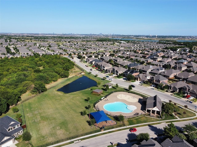 aerial view featuring a residential view and a water view