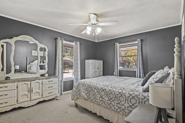 bedroom with ornamental molding, light colored carpet, a textured ceiling, and multiple windows