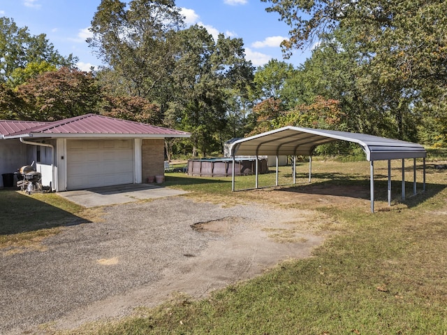 view of parking / parking lot with driveway and a carport