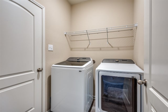 laundry area with laundry area and washer and dryer