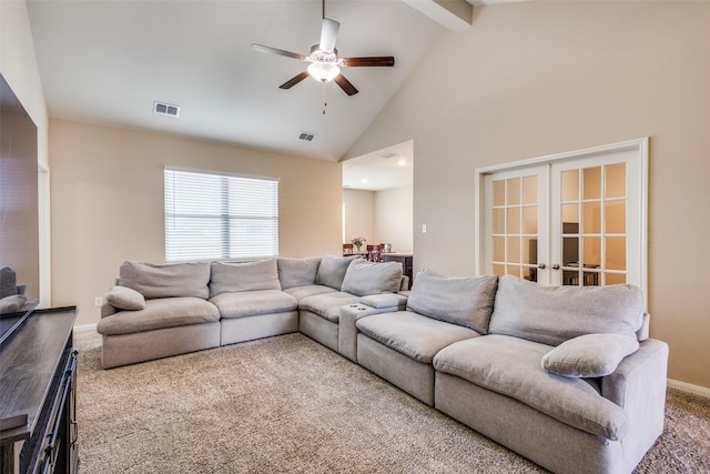 living area featuring carpet floors, french doors, beam ceiling, visible vents, and ceiling fan