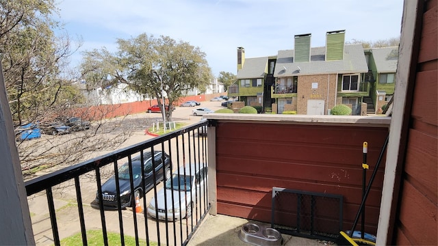 balcony featuring a residential view