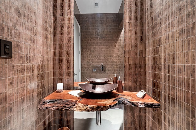 17704 Cedar Creek Canyon Dr, Dallas, TX 75252 - bathroom featuring tile walls and visible vents