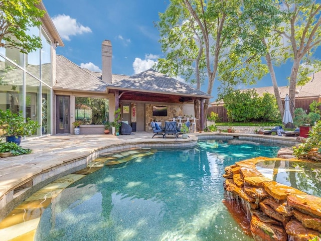 17704 Cedar Creek Canyon Dr, Dallas, TX 75252 - view of swimming pool with a fenced backyard, a patio, and a pool with connected hot tub