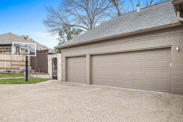 17704 Cedar Creek Canyon Dr, Dallas, TX 75252 - garage featuring fence and concrete driveway